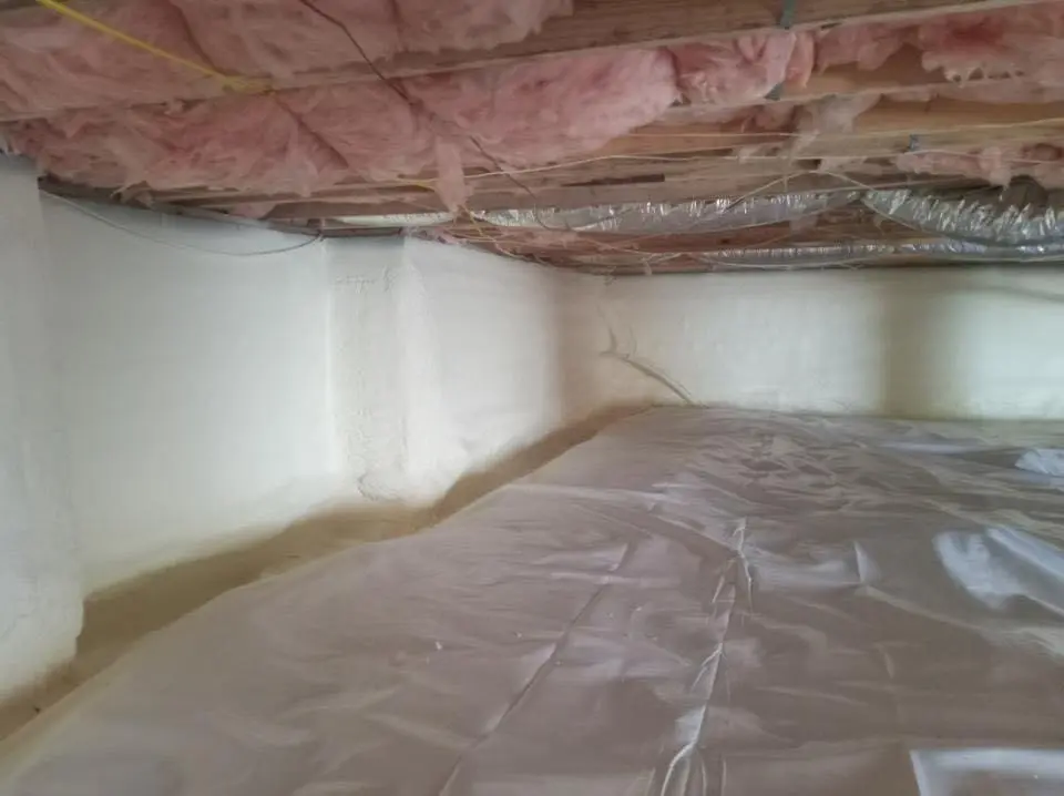 Crawl space encapsulation with closed-cell spray foam for Flat Roof Repair in Camden